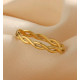 anillo trenzado de acero inoxidable dorado 
